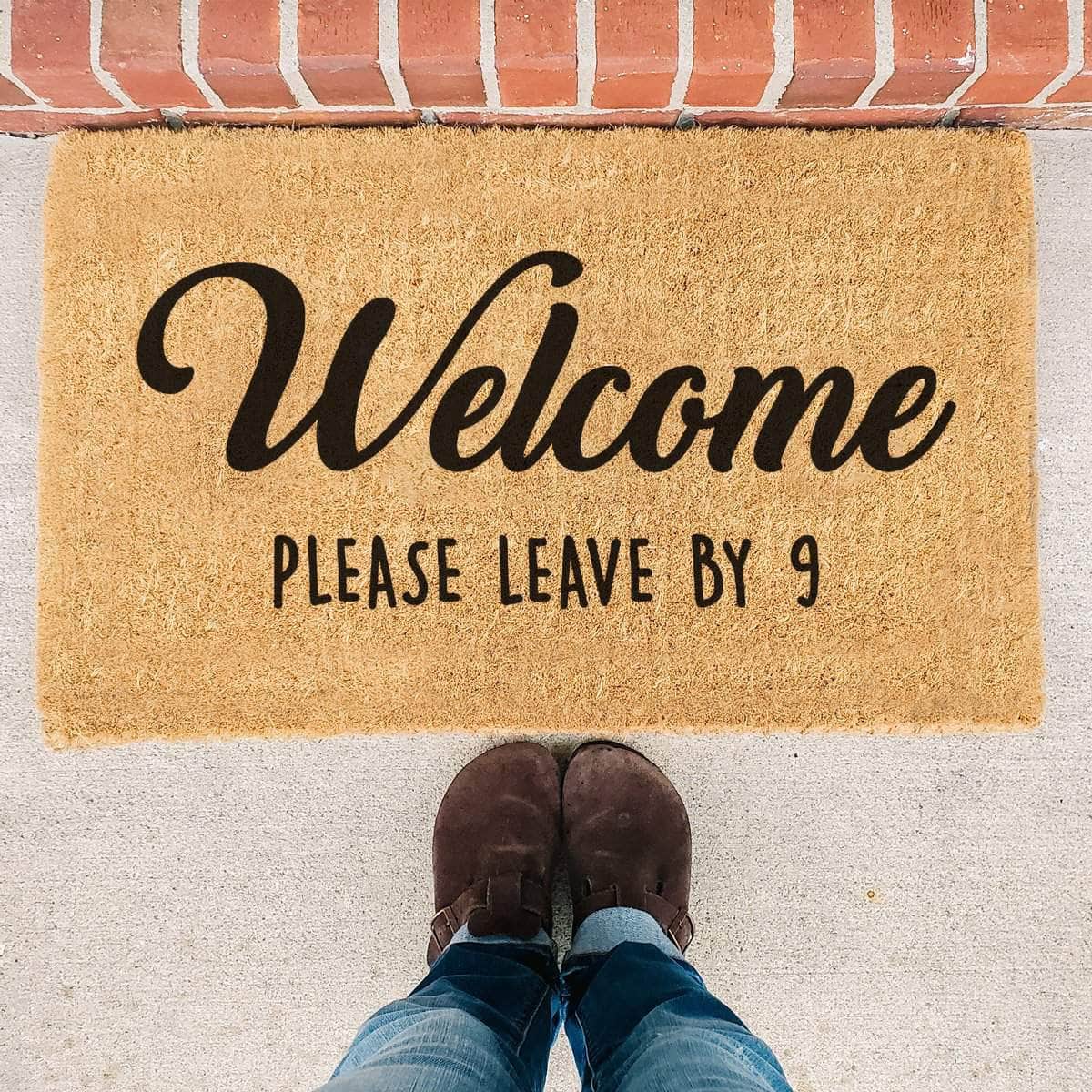 Welcome Please Leave By 9 - Doormat