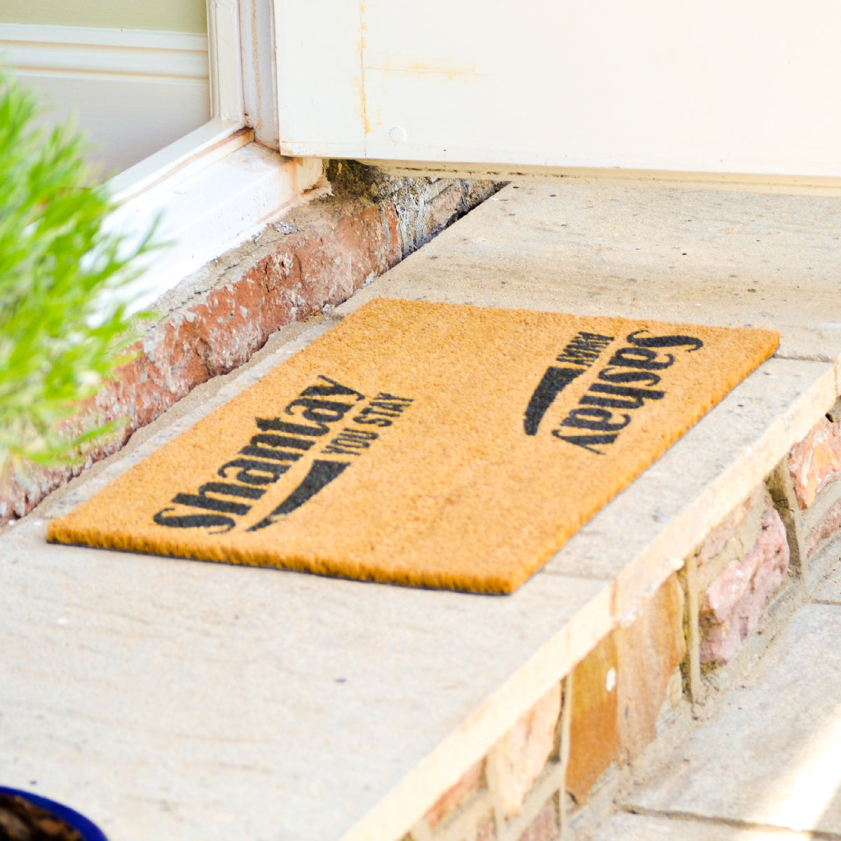 Coir doormat with RuPaul saying 'Shantay you stay, Sashay Away' printed on in it with black ink