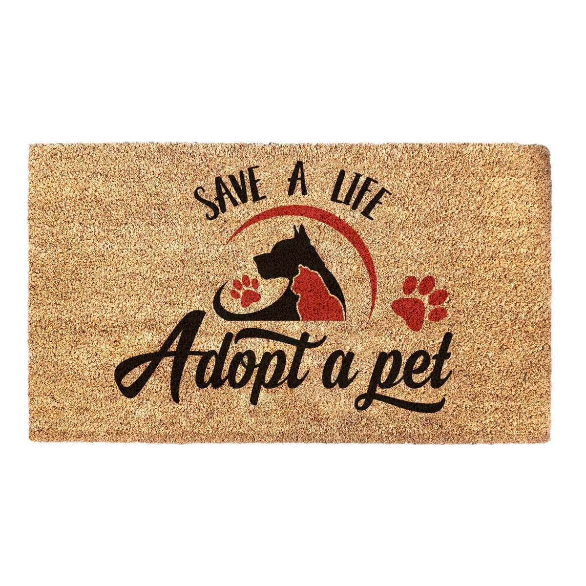 Coir doormat with cat and dog printed on it. Two paw prints and the words saying"save a life, adopt a pet" on it